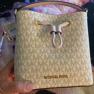 Michael Kors small purse, beige color with light pink
